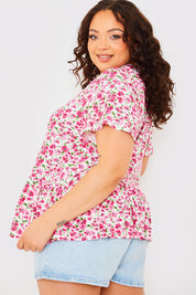 Sustainable Floral Peplum Top