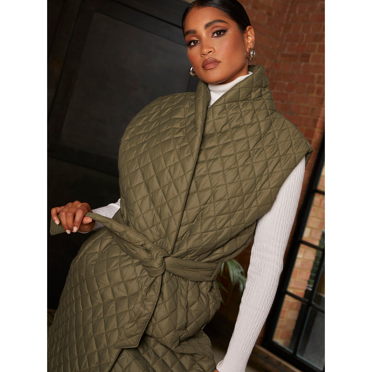 Chi Chi London Diamond Quilted Longline Belted Gilet in Khaki